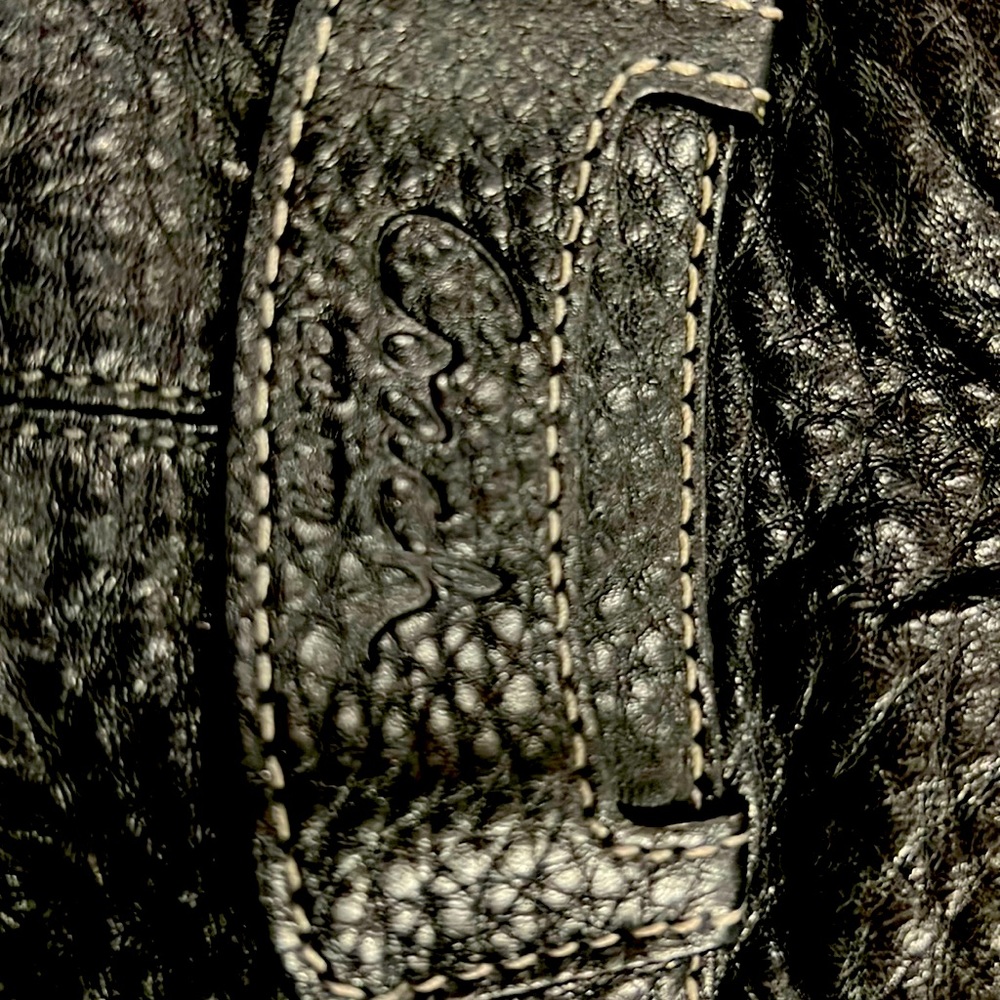 Vintage Black heavy leather. Very good condition